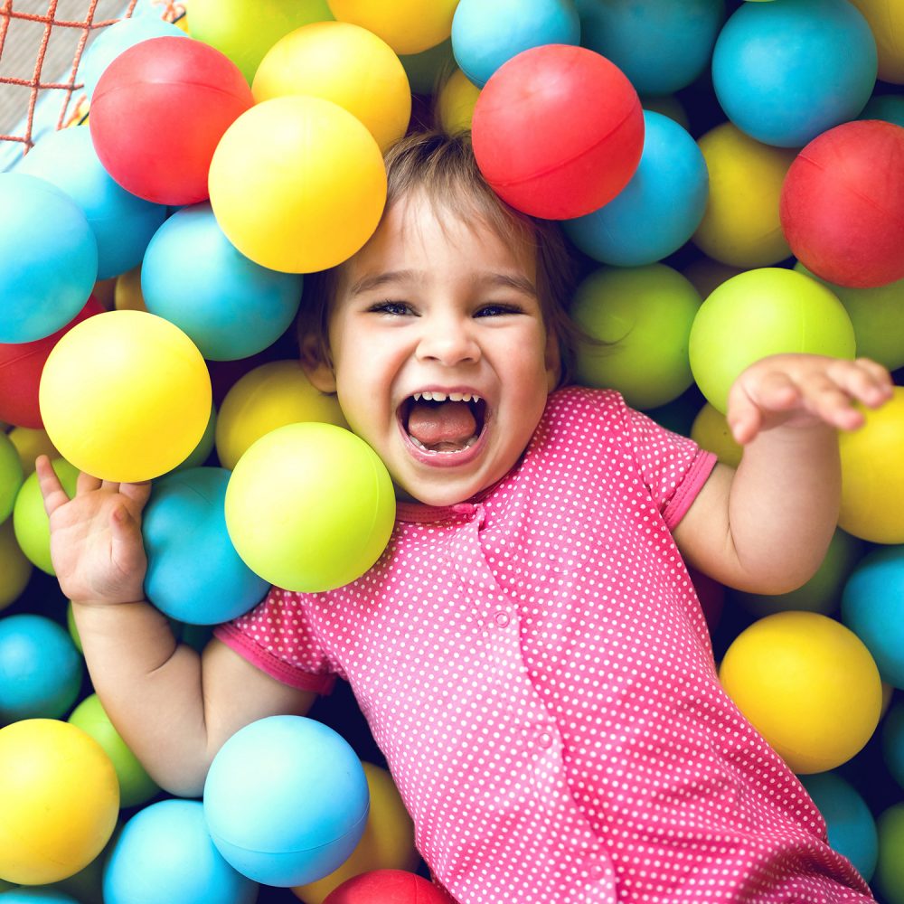 Little Child Girl Playing At Playground Outdoors